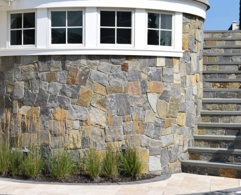 natural stone veneer house exterior , gray , brown