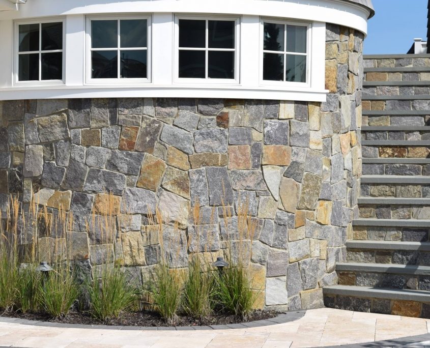 natural stone veneer house exterior , gray , brown