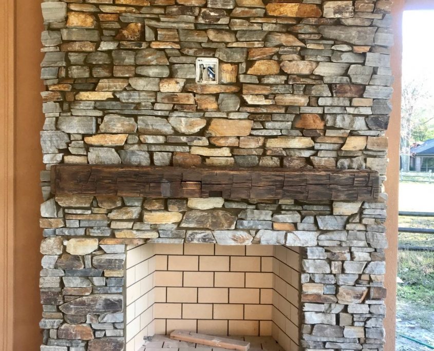 natural stone fireplace copper gray brown