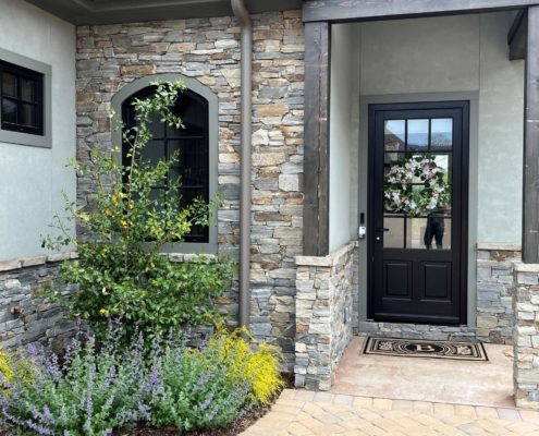 chocolate grey ledge stone , natural stone siding, stacked stone siding, cliffs at walnut cove home