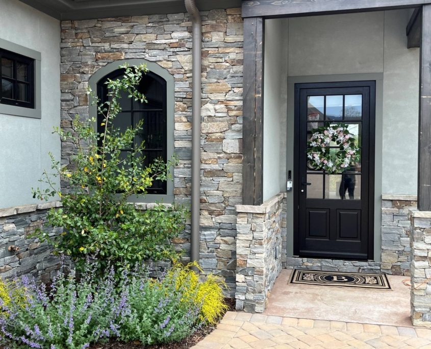 chocolate grey ledge stone , natural stone siding, stacked stone siding, cliffs at walnut cove home